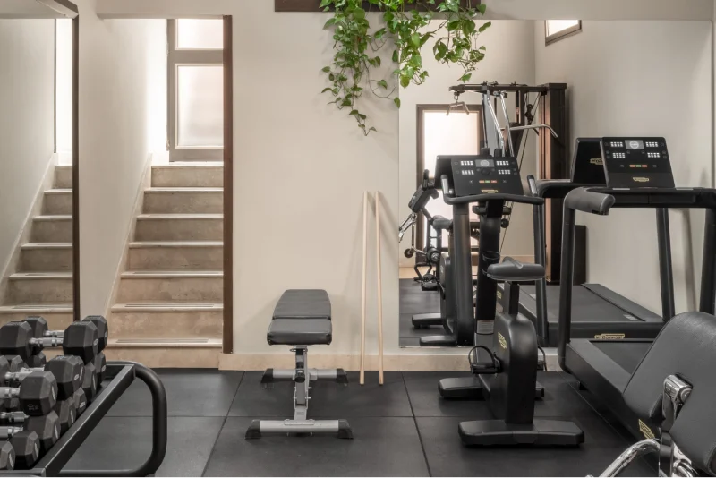 Hotel gym with treadmill, exercise bike, weights and fitness equipment for staying active during your Rome stay - Hotel Diocleziano, BZAR hotels in Rome