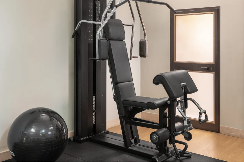 Professional multi-gym machine in the hotel fitness area dedicated to guest wellness and training - Hotel Diocleziano, BZAR hotels in Rome