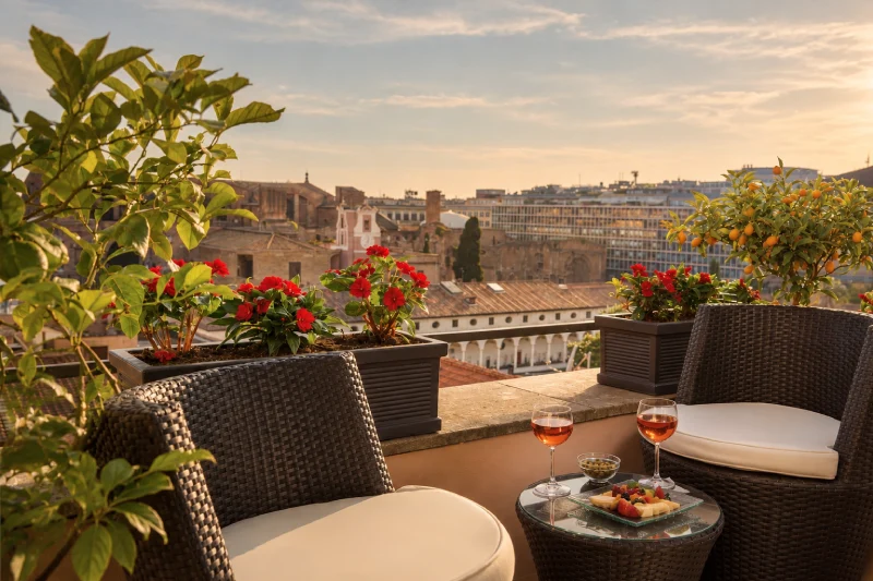 Terrace with armchairs, aperitif and view over Rome rooftops - Hotel Diocleziano, BZAR hotels in Rome